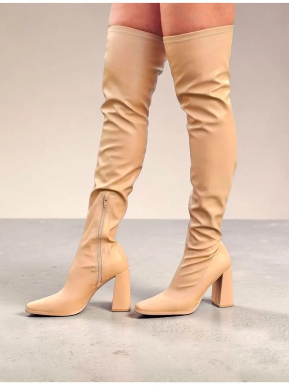 Over-The-Knee Block Heel Boots In Nude With Side Zipper Closure And Soft Faux Le